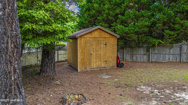 1360 Rays Bridge Rd, Whispering Pines, NC 28327 - view of shed featuring a fenced backyard