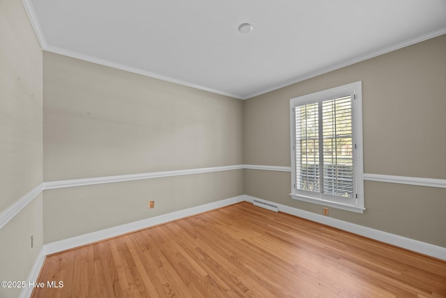 1909 Pawnee Dr, Kinston, NC 28504 - unfurnished room with wood finished floors and crown molding