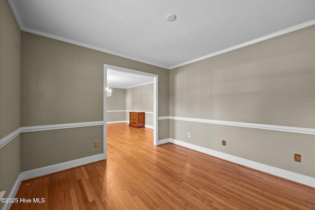 1909 Pawnee Dr, Kinston, NC 28504 - empty room with wood finished floors and ornamental molding