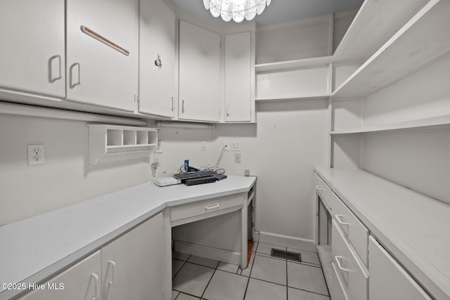 1909 Pawnee Dr, Kinston, NC 28504 - washroom with light tile patterned flooring and an office area