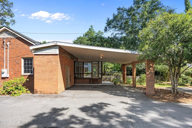 1909 Pawnee Dr, Kinston, NC 28504 - exterior space featuring driveway, a carport, and entry steps