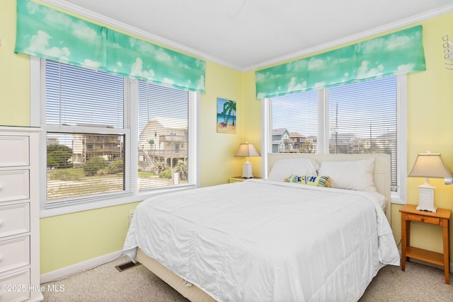 2101 Ocean Dr Unit A, Emerald Isle, NC 28594 - bedroom featuring crown molding and light colored carpet