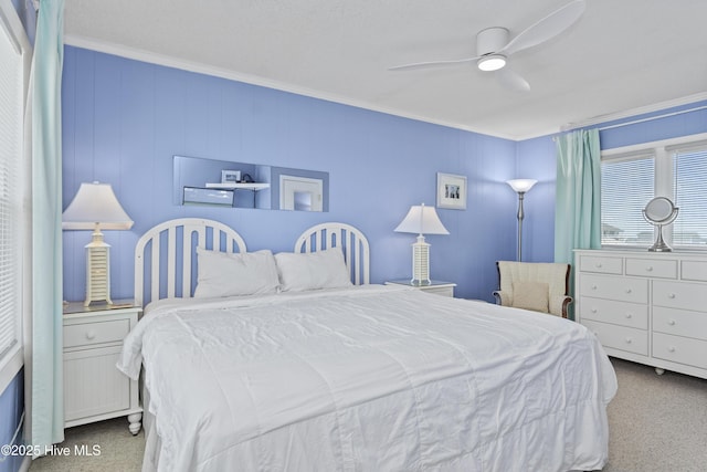 2101 Ocean Dr Unit A, Emerald Isle, NC 28594 - bedroom featuring carpet floors, ornamental molding, and ceiling fan