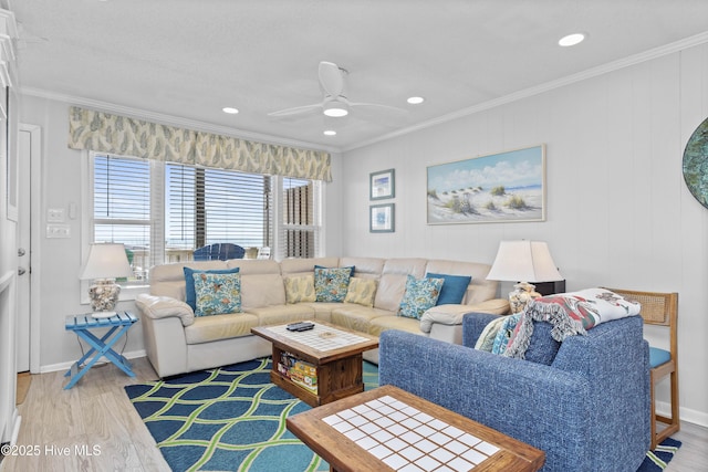 2101 Ocean Dr Unit A, Emerald Isle, NC 28594 - living room featuring wood finished floors, crown molding, a ceiling fan, and recessed lighting