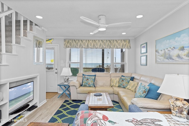 2101 Ocean Dr Unit A, Emerald Isle, NC 28594 - living area featuring crown molding, wood finished floors, recessed lighting, and ceiling fan
