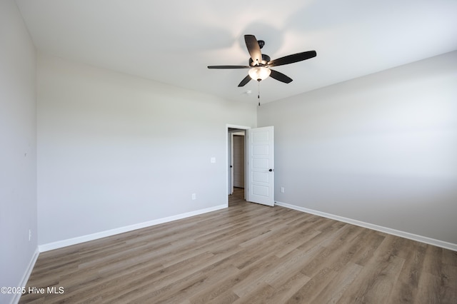6001 Farmwood Loop, Wilson, NC 27896 - spare room with wood finished floors and a ceiling fan