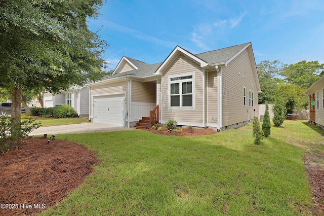 215 NE 54th St, Oak Island, NC 28465 - single story home with crawl space, a garage, concrete driveway, and a front lawn