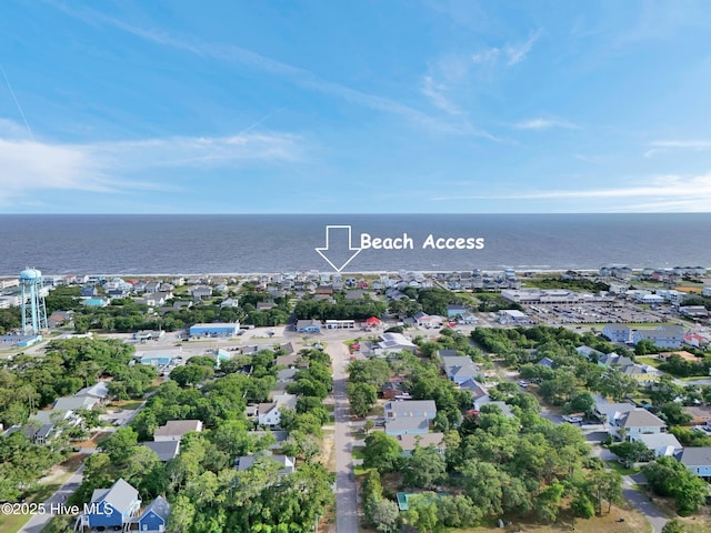 215 NE 54th St, Oak Island, NC 28465 - aerial perspective of suburban area featuring a large body of water