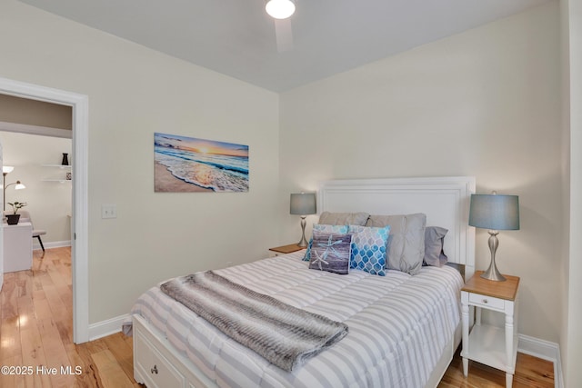 215 NE 54th St, Oak Island, NC 28465 - bedroom with light wood-style flooring