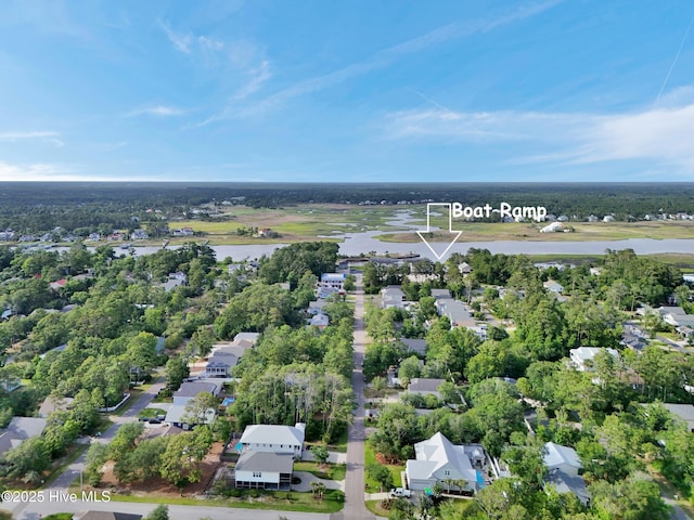 215 NE 54th St, Oak Island, NC 28465 - aerial view of residential area with a nearby body of water