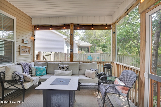 215 NE 54th St, Oak Island, NC 28465 - sunroom / solarium with an outdoor hangout area