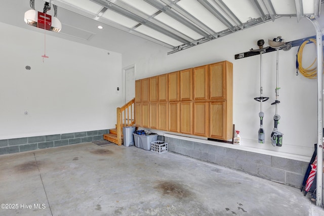 215 NE 54th St, Oak Island, NC 28465 - garage featuring a garage door opener