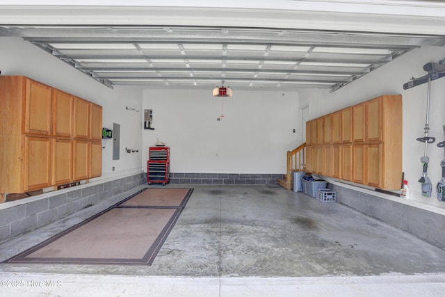 215 NE 54th St, Oak Island, NC 28465 - garage featuring a garage door opener