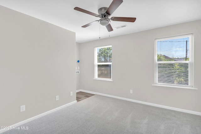 1004 S 8th St, Wilmington, NC 28401 - spare room with carpet flooring and a ceiling fan
