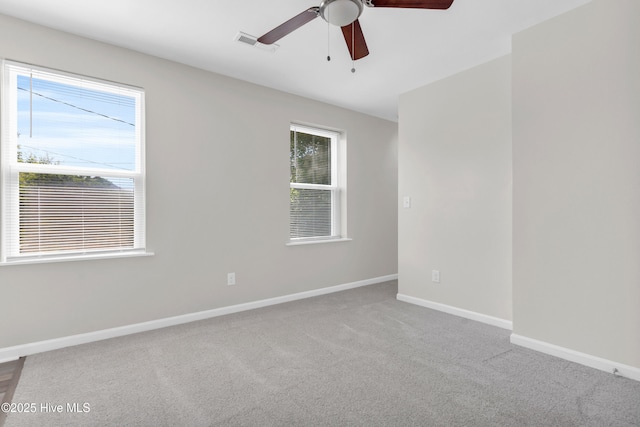 1004 S 8th St, Wilmington, NC 28401 - carpeted empty room with a ceiling fan and baseboards