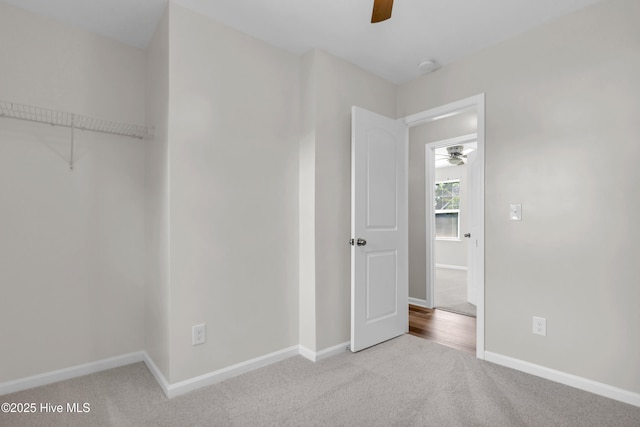 1004 S 8th St, Wilmington, NC 28401 - unfurnished bedroom with carpet flooring, ceiling fan, and a closet