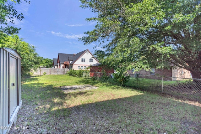 1004 S 8th St, Wilmington, NC 28401 - fenced backyard with a storage unit