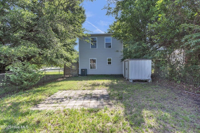 1004 S 8th St, Wilmington, NC 28401 - rear view of property with a storage shed and a patio