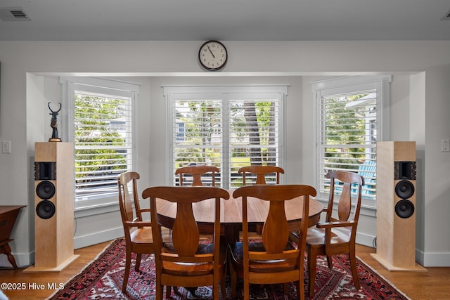 110 Mariners Ct, New Bern, NC 28562 - dining area with light wood-style floors and plenty of natural light
