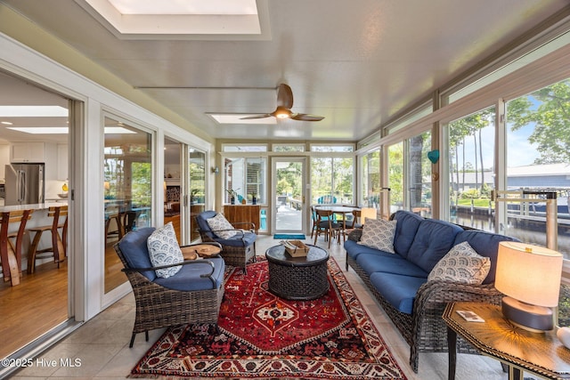 110 Mariners Ct, New Bern, NC 28562 - sunroom / solarium featuring outdoor lounge area, a ceiling fan, a water view, and a skylight