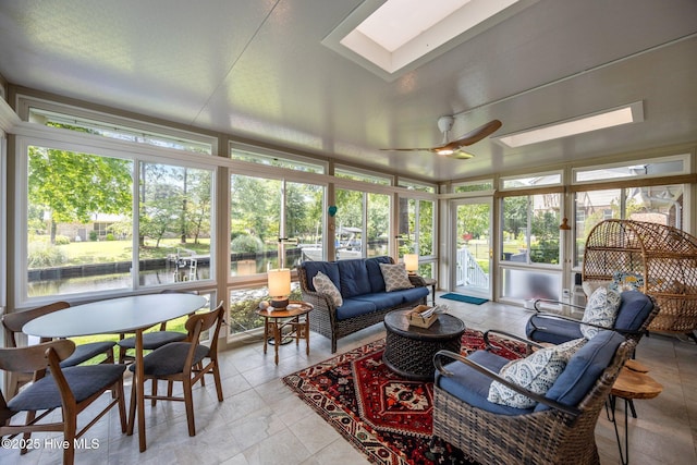 110 Mariners Ct, New Bern, NC 28562 - sunroom / solarium with a skylight, an outdoor hangout area, ceiling fan, and a water view
