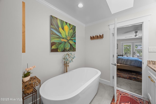 110 Mariners Ct, New Bern, NC 28562 - full bath with french doors, a freestanding bath, ensuite bath, ornamental molding, and a skylight