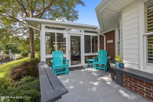 110 Mariners Ct, New Bern, NC 28562 - view of patio featuring a sunroom and a wooden deck