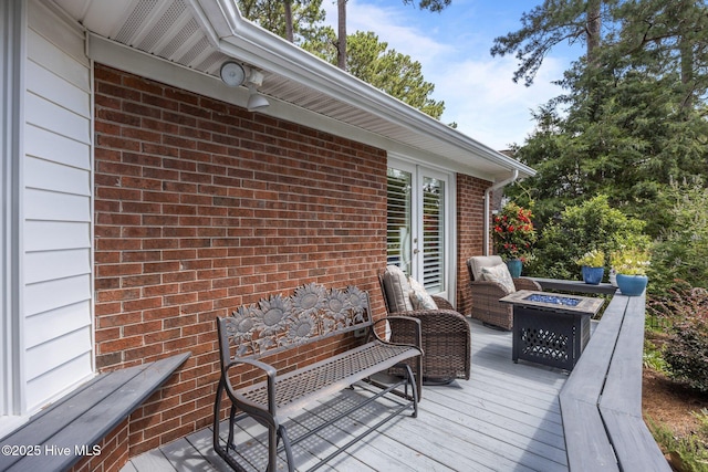 110 Mariners Ct, New Bern, NC 28562 - wooden deck featuring an outdoor fire pit