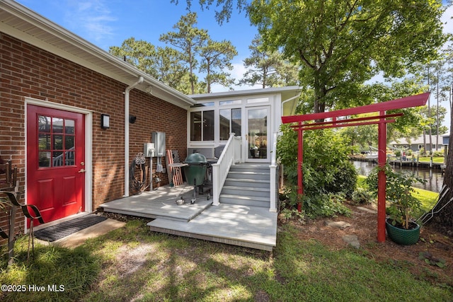 110 Mariners Ct, New Bern, NC 28562 - wooden deck featuring a water view, a sunroom, and area for grilling