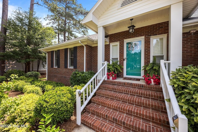 110 Mariners Ct, New Bern, NC 28562 - doorway to property featuring brick siding