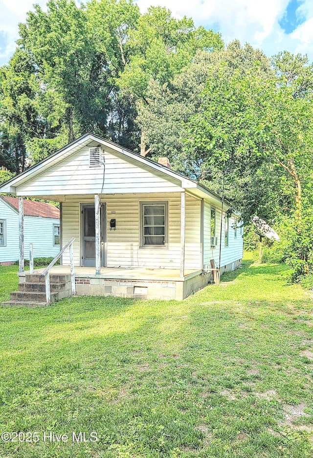 1333 Weldon Ave, Rocky Mount, NC 27804 - view of front facade with a front yard, a porch, and crawl space