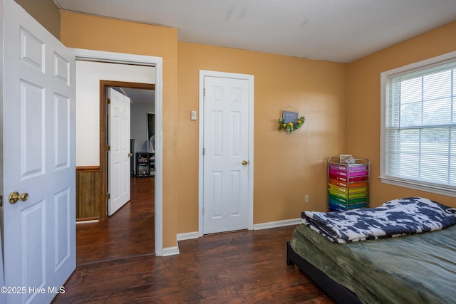 800 S Vance St, Fremont, NC 27830 - bedroom with wood finished floors and multiple windows