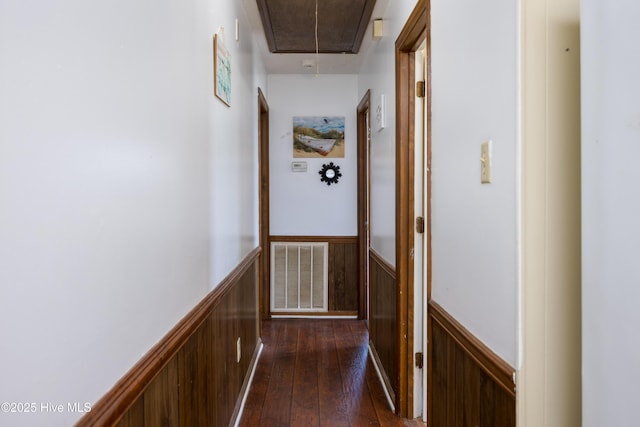800 S Vance St, Fremont, NC 27830 - hallway featuring attic access, wainscoting, and dark wood-style flooring