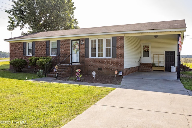 800 S Vance St, Fremont, NC 27830 - view of front of home featuring crawl space, a front lawn, concrete driveway, a carport, and entry steps