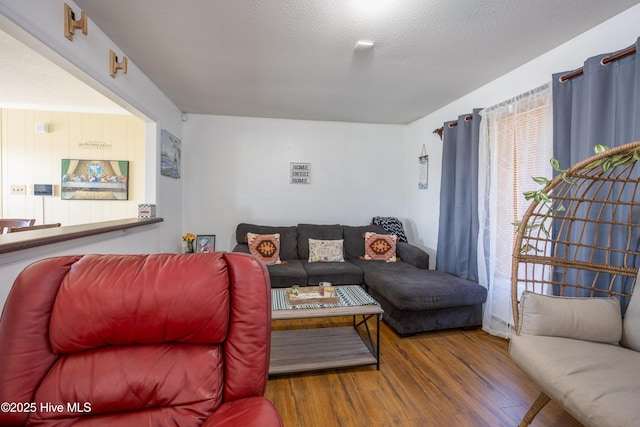 800 S Vance St, Fremont, NC 27830 - living room featuring wood finished floors and a textured ceiling