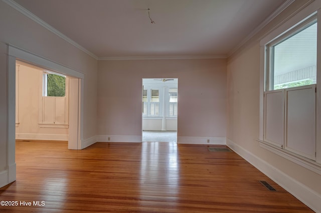 1305 N Market St, Washington, NC 27889 - unfurnished room featuring hardwood / wood-style flooring and crown molding