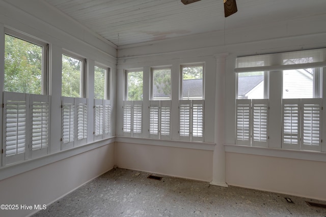 1305 N Market St, Washington, NC 27889 - unfurnished sunroom featuring baseboards