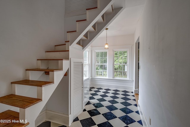 1305 N Market St, Washington, NC 27889 - stairs featuring tile patterned floors and baseboards