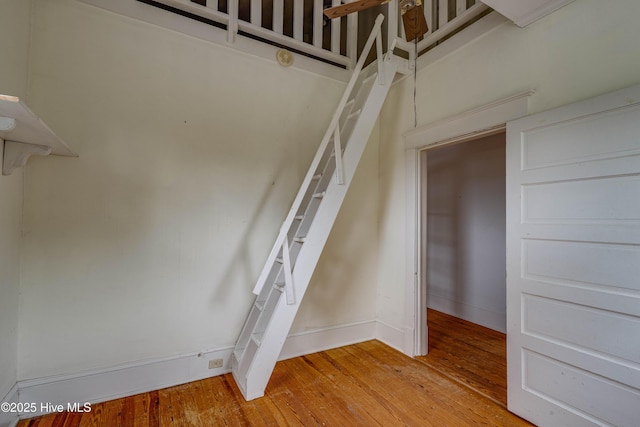 1305 N Market St, Washington, NC 27889 - stairway featuring hardwood / wood-style floors and baseboards