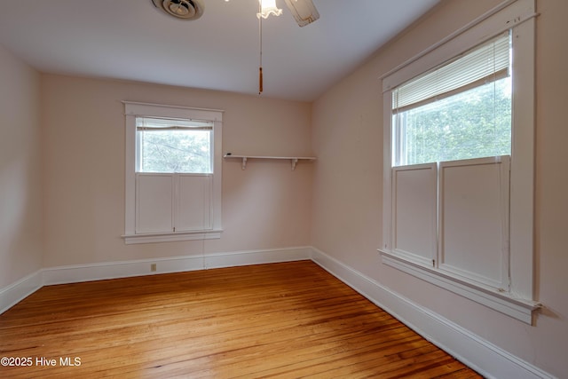 1305 N Market St, Washington, NC 27889 - empty room featuring light wood-type flooring and ceiling fan