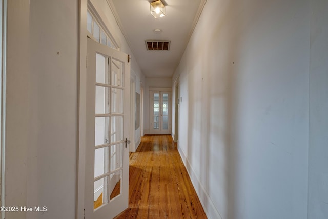 1305 N Market St, Washington, NC 27889 - corridor featuring hardwood / wood-style floors and french doors
