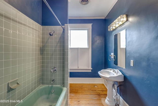 1305 N Market St, Washington, NC 27889 - bathroom with wood finished floors,  shower combination, and crown molding