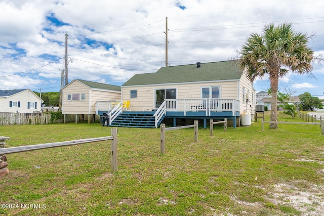 1086 Salter Path Rd, Salter Path, NC 28512 - back of property with a wooden deck and roof with shingles