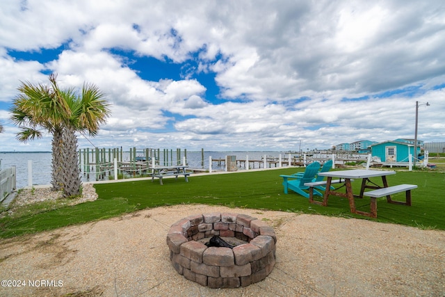 1086 Salter Path Rd, Salter Path, NC 28512 - view of grassy yard with an outdoor fire pit, a water view, and a boat dock
