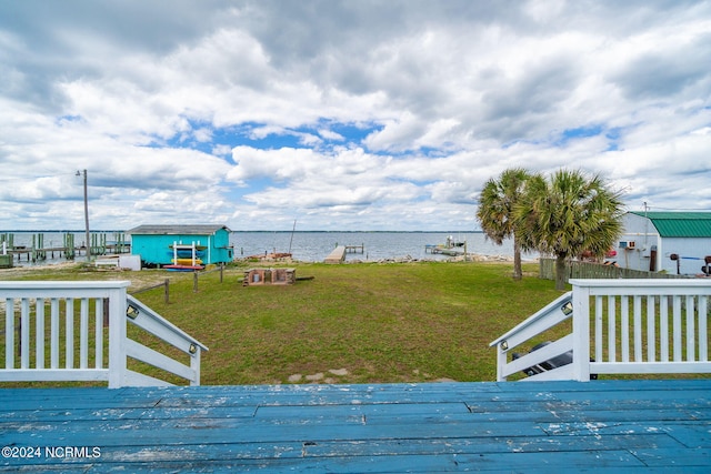 1086 Salter Path Rd, Salter Path, NC 28512 - view of grassy yard featuring a deck with water view