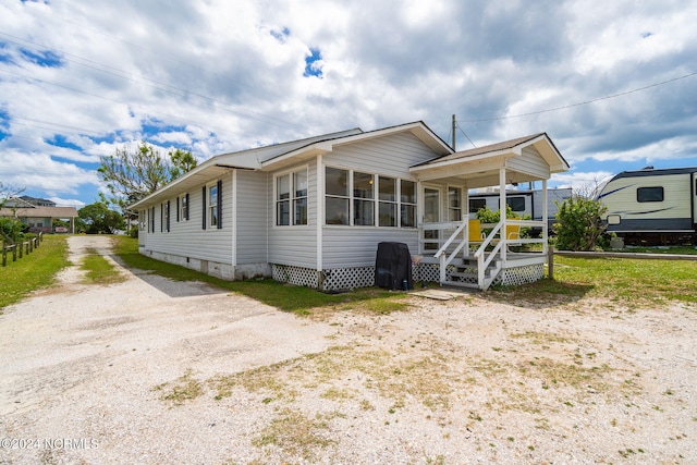 1086 Salter Path Rd, Salter Path, NC 28512 - view of front of home with a sunroom and crawl space