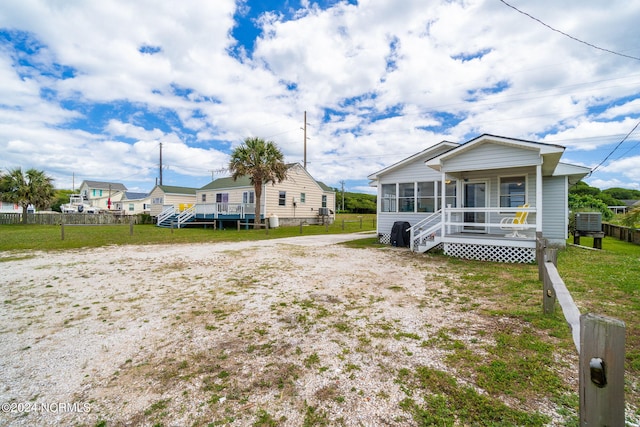 1086 Salter Path Rd, Salter Path, NC 28512 - view of front of home featuring a sunroom
