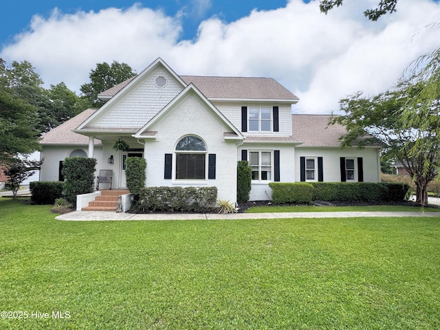4109 Devonshire Ln, Wilmington, NC 28409 - view of front of house with roof with shingles and a front yard