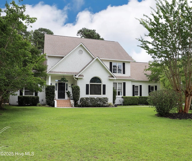 4109 Devonshire Ln, Wilmington, NC 28409 - view of front of house featuring a front yard and a shingled roof