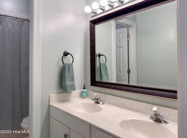 4109 Devonshire Ln, Wilmington, NC 28409 - bathroom featuring double vanity and a shower with shower curtain